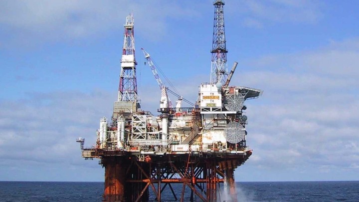 Offshore oil platform against the ocean and blue sky