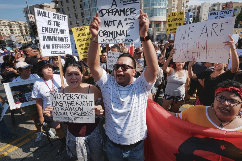 Protesters rally in support of the Deferred Action for Childhood Arrivals, or DACA, during a Labor Day rally in downtown Los Angeles on September 4.