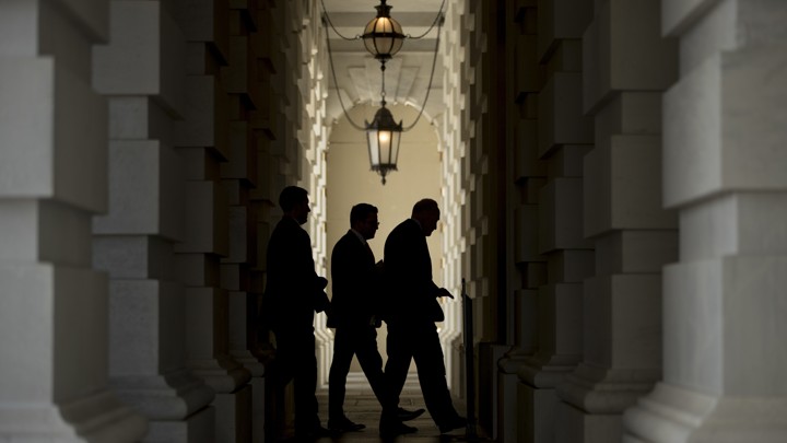 Senate Minority Leader Chuck Schumer (right) walks into the Capitol after attending a rally on Capitol Hill this week.