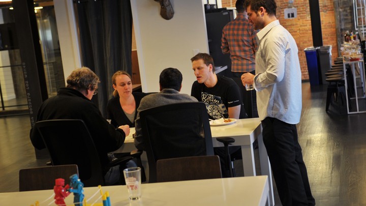 Workers gathered at a WeWork location in Washington, D.C.