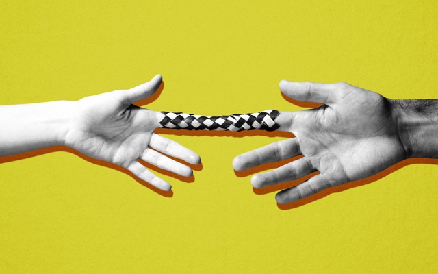 Two hands stuck in a finger trap, pulling away from each other
