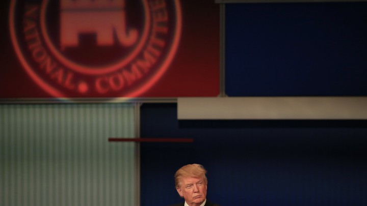 President Donald Trump looks sideways.