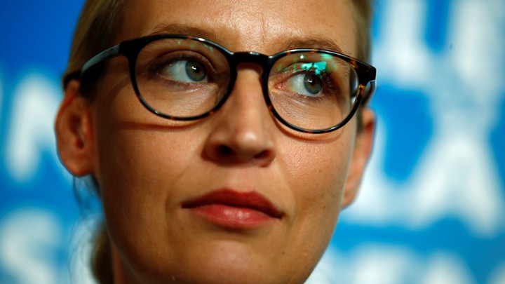 Co-lead AFD candidate Alice Weidel against a blue backdrop.