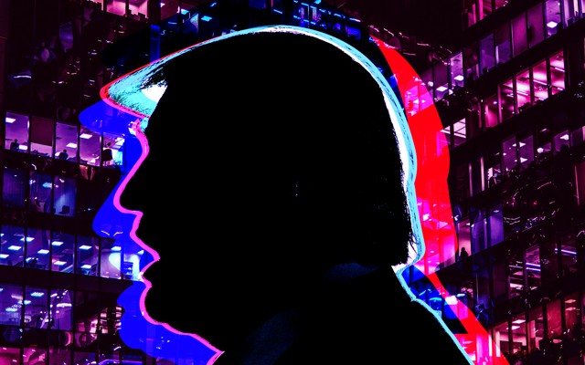 A silhouette of Donald trump is seen in contrast against Moscow buildings.