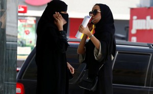 Saudi women speak on their phones in Riyadh.