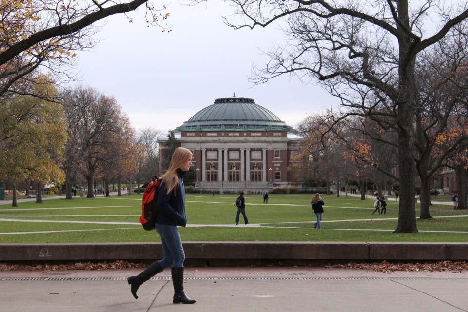 Students walk across the campus of the University of Illinois at Urbana-Champaign.