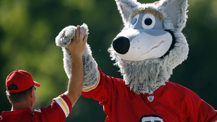 KC Wolf and a Kansas City Chiefs fan