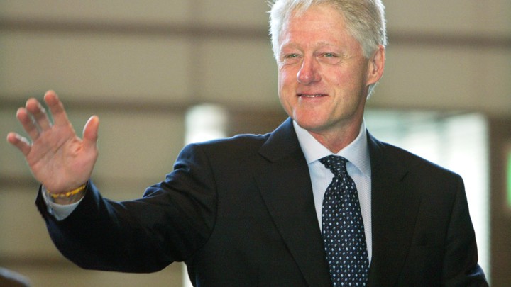 President Clinton waves