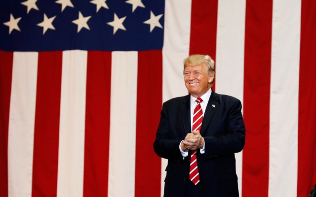 Donald Trump in front of the American flag