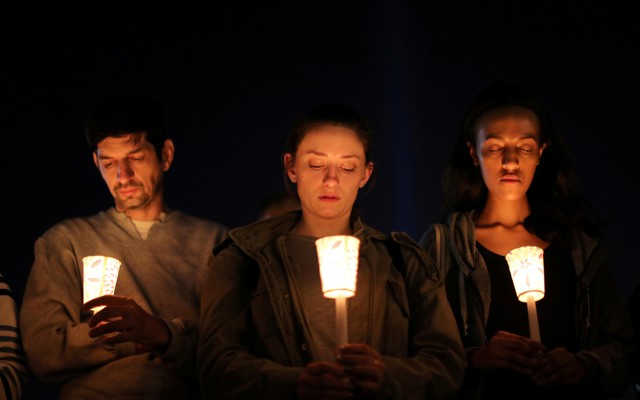 Mourners holding candles at a vigil following the Las Vegas shooting