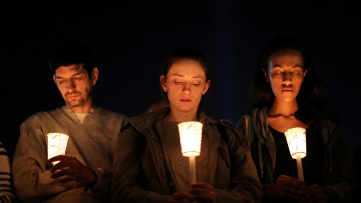 Mourners holding candles at a vigil following the Las Vegas shooting