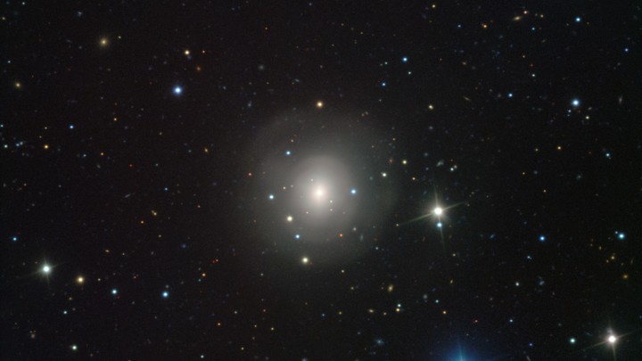 A starry sky with one very bright spot centered