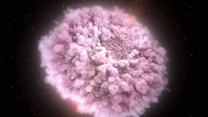 An illustration of the cloud of debris surrounding two neutron stars just before they collide