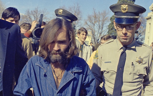 Charles Manson in handcuffs in 1970