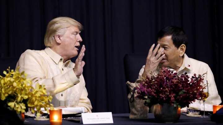 President Trump talks with Philippines President Rodrigo Duterte.