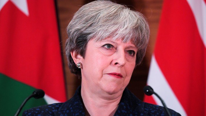 U.K. Prime Minister Theresa May attends a press conference in Amman, Jordan on November 30, 2017.
