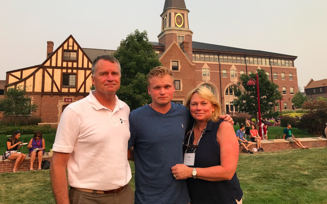 From left to right: James, Jonathan, and Mary Winnefeld at the University of Denver campus