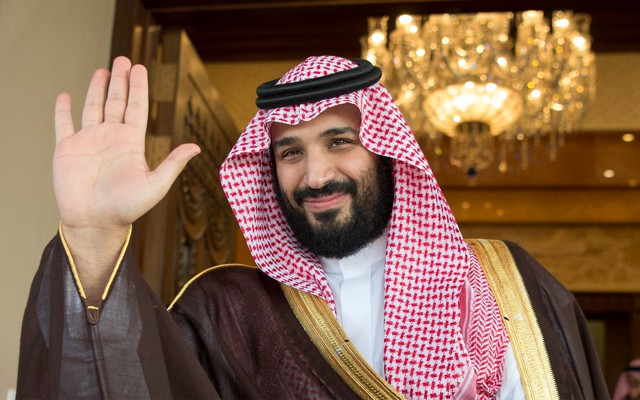 Mohammed bin Salman waves in Riyadh, Saudi Arabia.