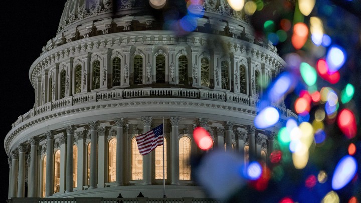 The Capitol dome framed by Christmas lights
