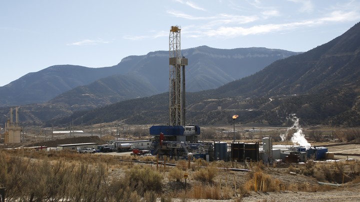 A fracking well near mountains