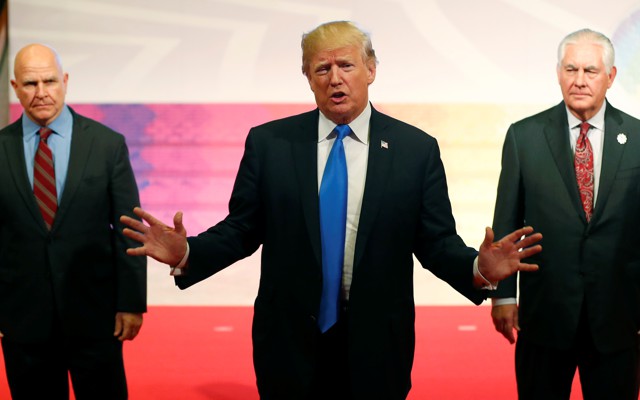 Donald Trump gestures with National Security Advisor H.R. McMaster and Secretary of State Rex Tillerson