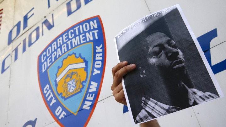 A picture of Kalief Browder in front of a building on Riker's Island