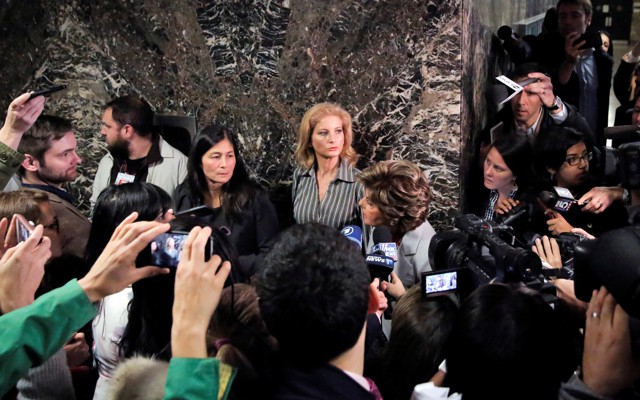 Summer Zervos, a former contestant on The Apprentice, leaves court after a hearing in her defamation case against President Trump on December 5.