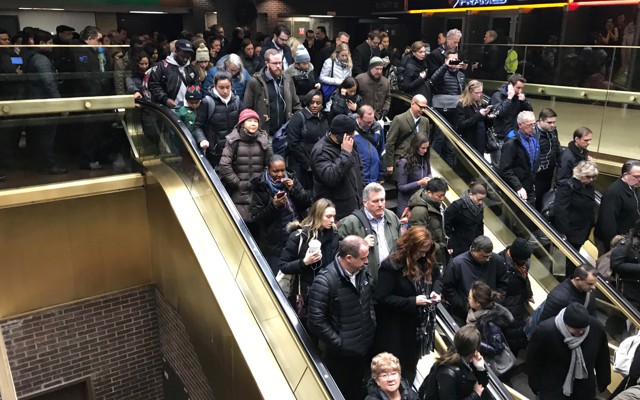 Commuters exit the New York Port Authority after reports of an explosion.