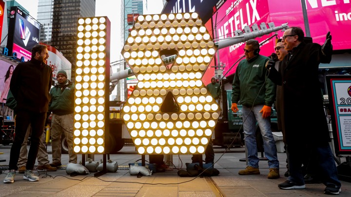 The "18" Numerals are turned on after being delivered to be placed atop 1 Times Square for the New Year's Eve ball drop.