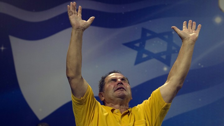 A Christian worshipper prays during an evangelical rally in Jerusalem.