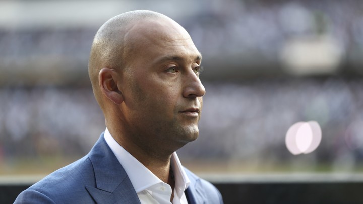Derek Jeter participates in a ceremony to retire his number at Yankee Stadium