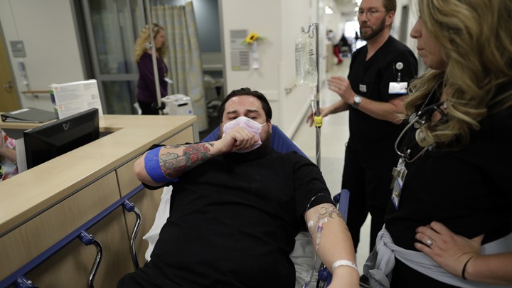 Man in hospital with face mask