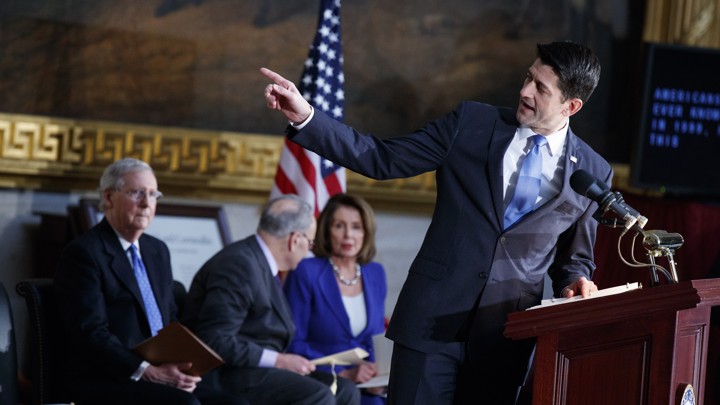 Paul Ryan speaks in front of Mitch McConnell, Chuck Schumer, and Nancy Pelosi on Capitol Hill.