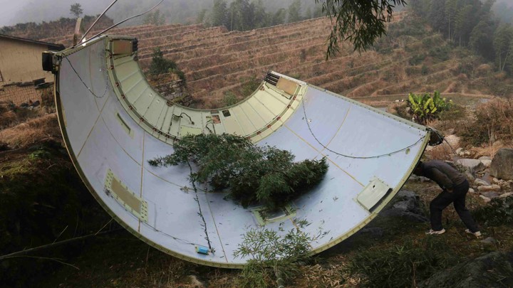 A piece of a Long March 3B rocket after it fell in a field in China's central Jiangxi province on December 11, 2016