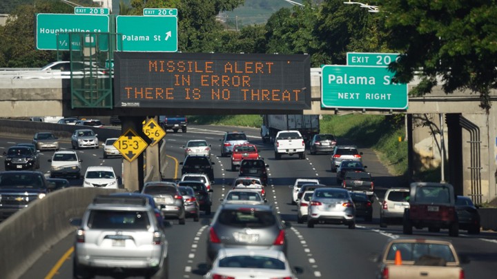 sign on a highway in Honolulu clarifies that the emergency nuclear missile alert was a false alarm.