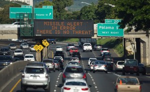 sign on a highway in Honolulu clarifies that the emergency nuclear missile alert was a false alarm. 