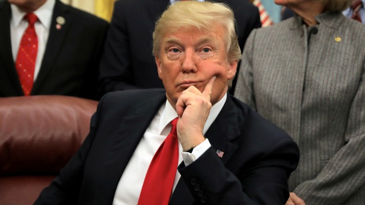 President Trump is pictured in the Oval Office on January 10, 2018.