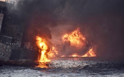An oil tanker engulfed in flame