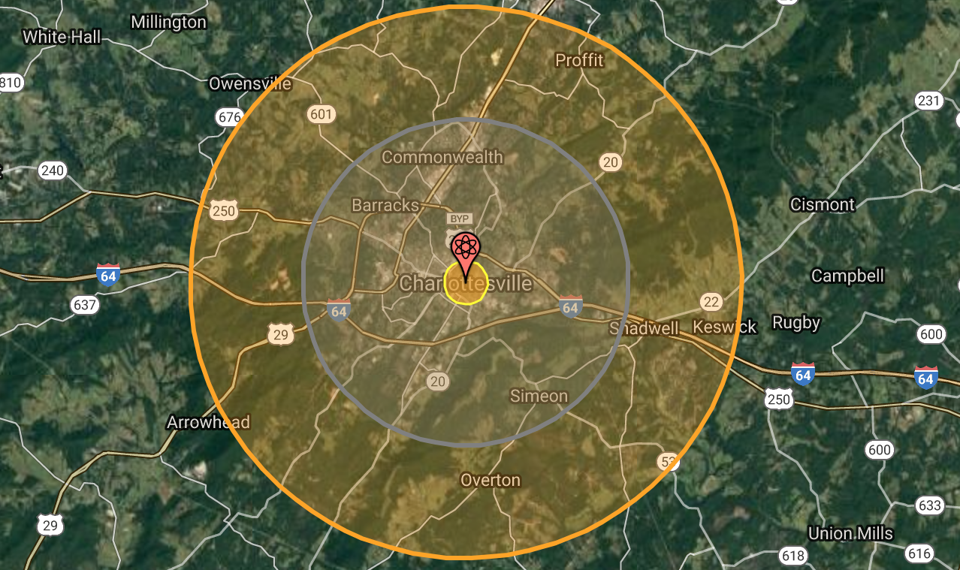 A satellite map with a pin, marked with the atomic symbol, and concentric circles over Charlottesville