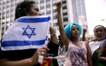 A migrant from Eritrea gestures during a protest in Israel.