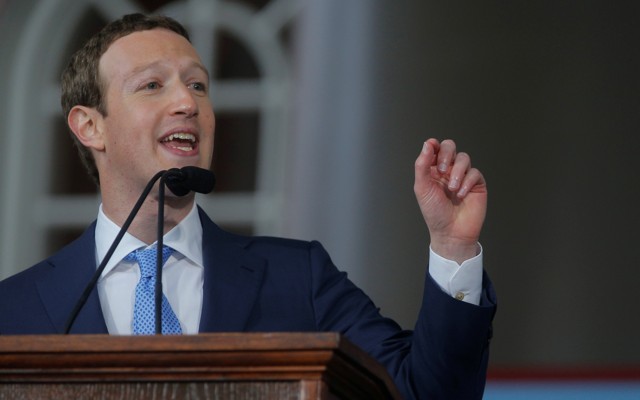Mark Zuckerberg stands at a podium. 