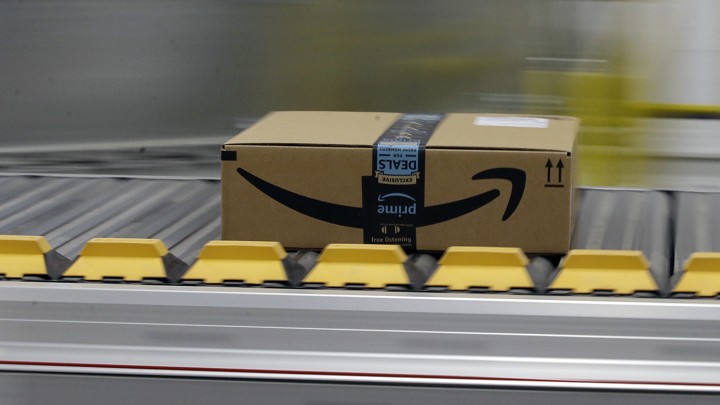 An Amazon prime package on a conveyor belt