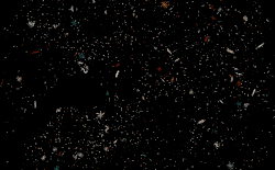 A sphere of small particles expands and contracts against a black background.