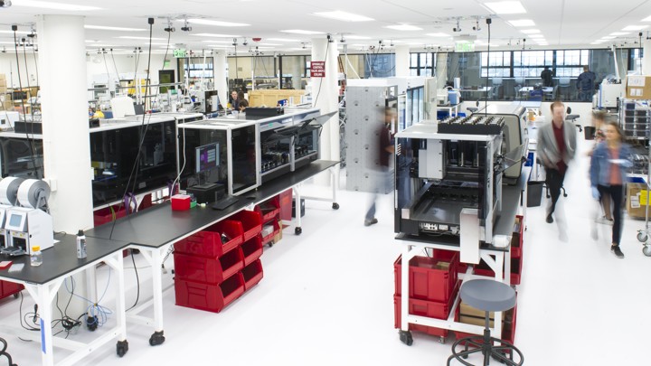 A brightly lit, colorful lab space