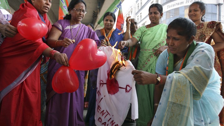 Activists from the Bharatiya Janata Party burn an effigy representing Valentine's Day.