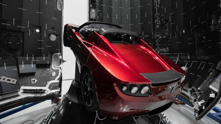 A red Tesla Roadster