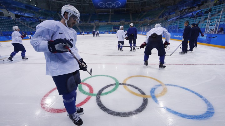 Members of the U.S. men's ice hockey team team train.