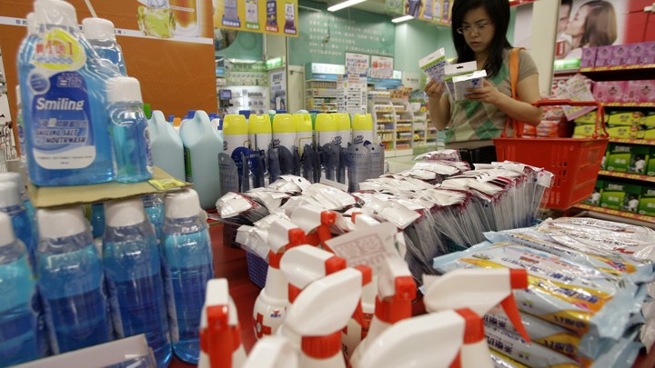 A customer looks at face masks in the antiflu section at a supermarket in Taipei.