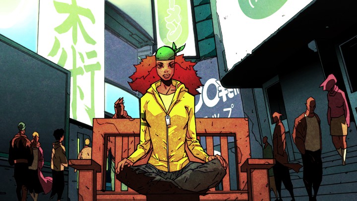 A woman sitting cross-legged on a bench