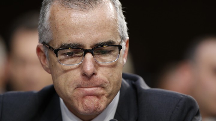 Former FBI Deputy Director Andrew McCabe, wearing glasses, at a Senate hearing